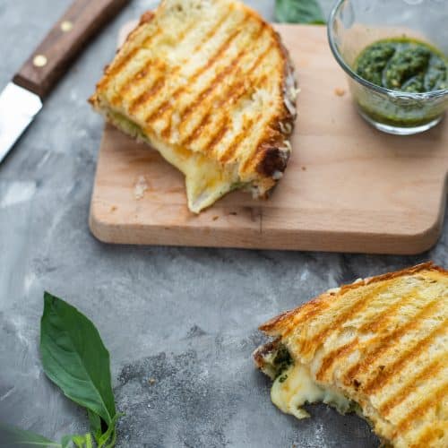 Golden, melty, delicious grilled cheese with pesto on sourdough