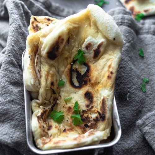 Easy homemade naan that's fluffy and pillowy soft. Perfect alongside a warm curry!