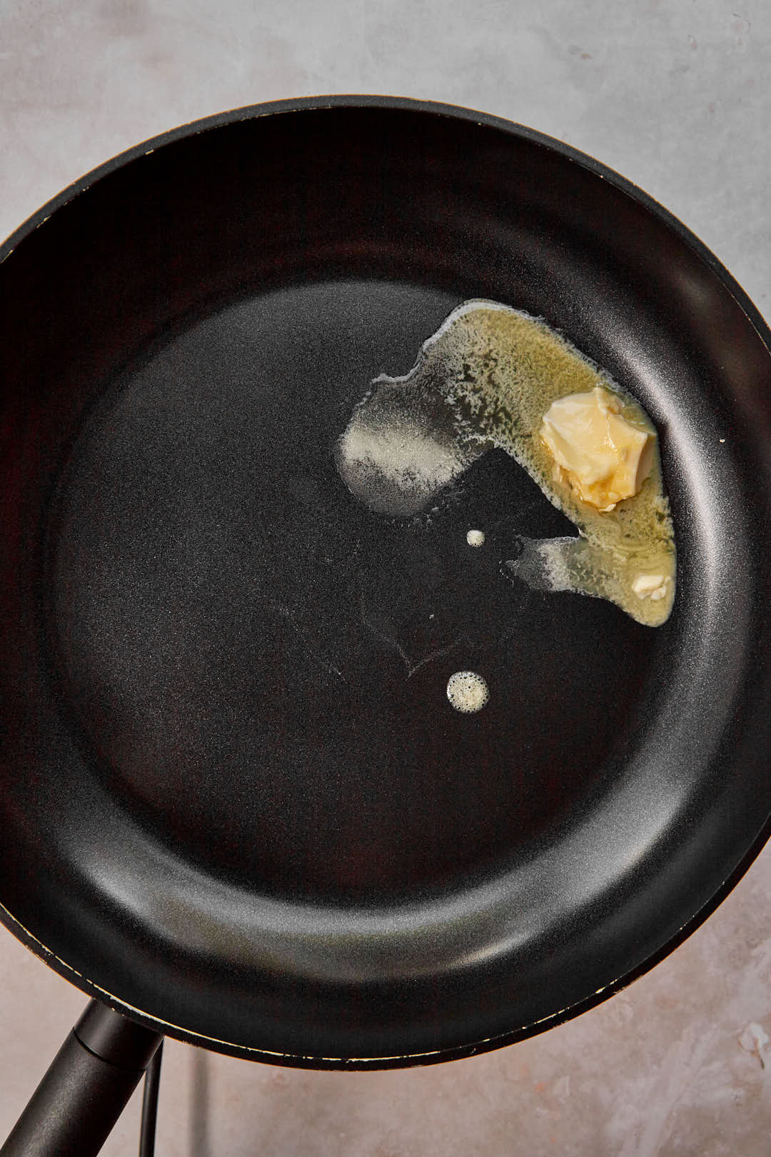melted butter in large dark saucepan.