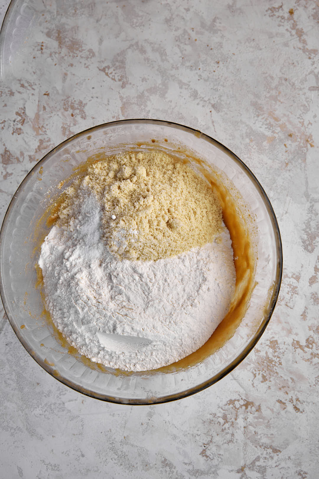 almond flour and flour in a clear glass bowl.