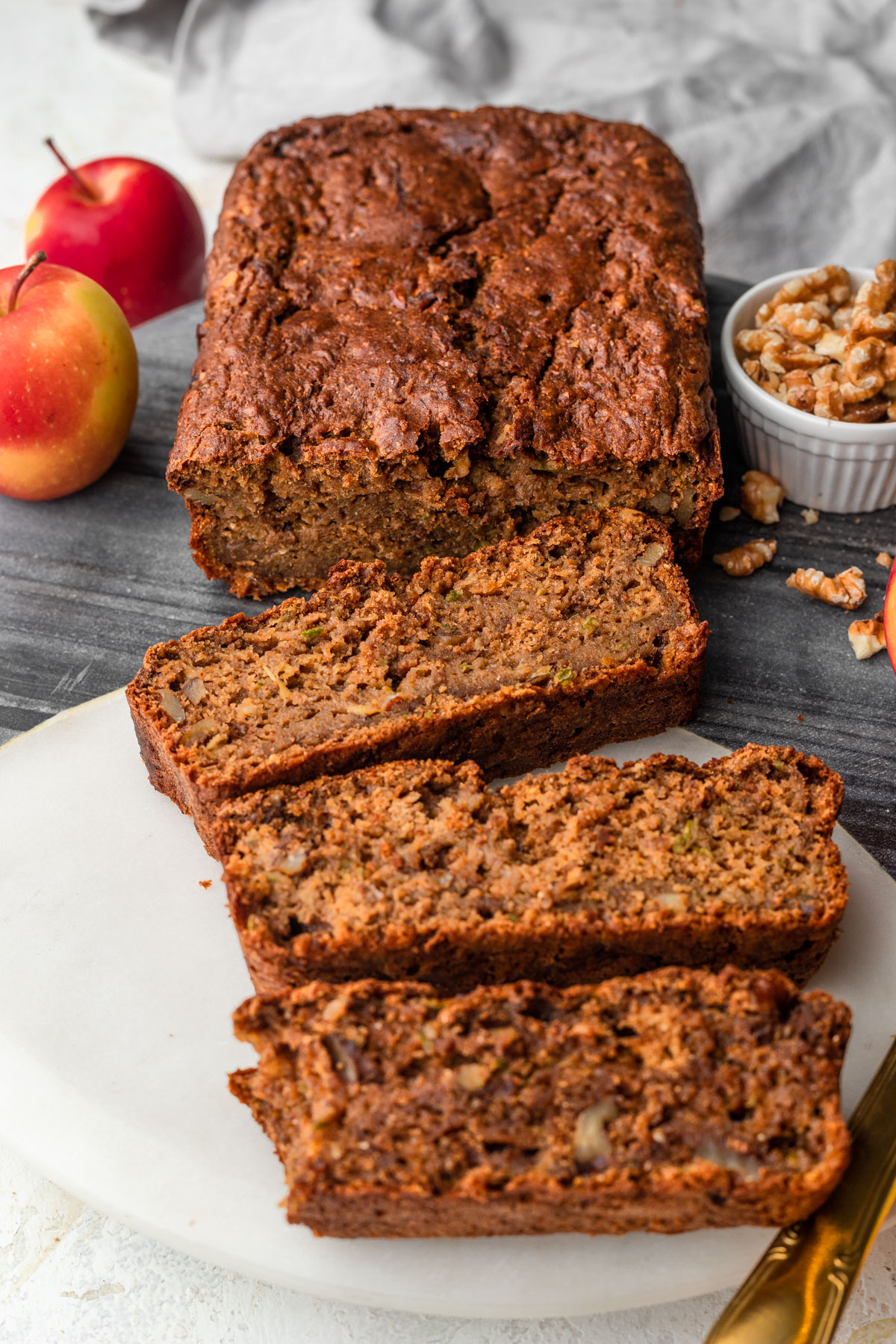 Close up photo of slices of healthy apple zucchini cake.