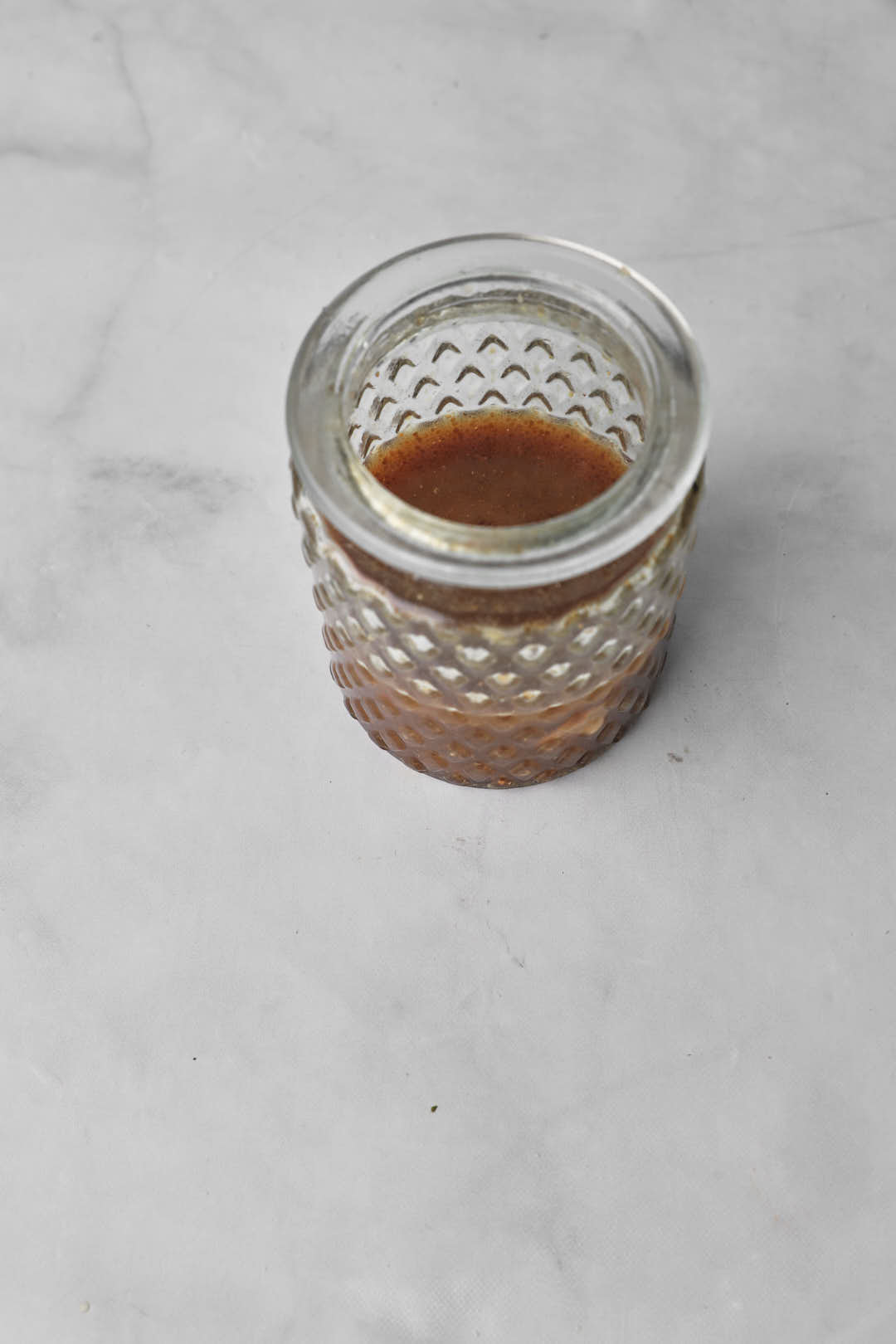 asian salad dressing in a glass jar.