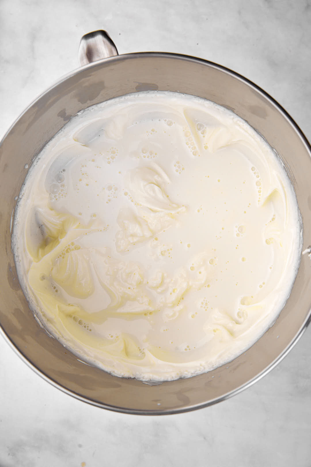 cream cheese and sugar creamed together in mixing bowl