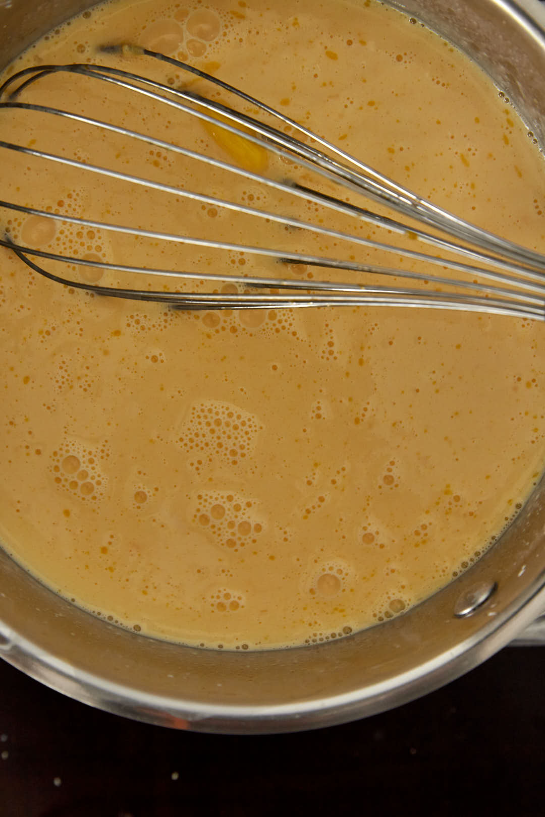 custard in saucepan in stovetop.