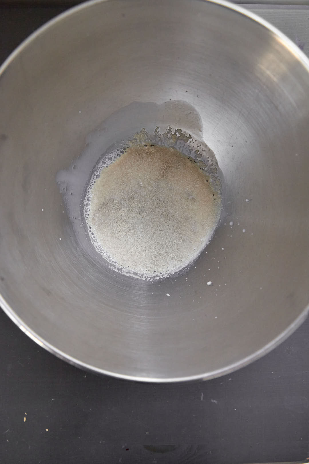 warm milk and yeast in stand mixer owl.