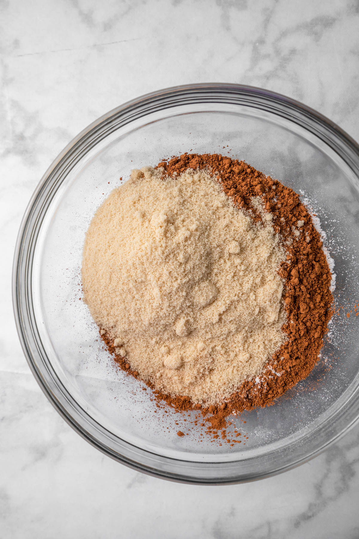 brown sugar and cocoa powder in a glass bowl.