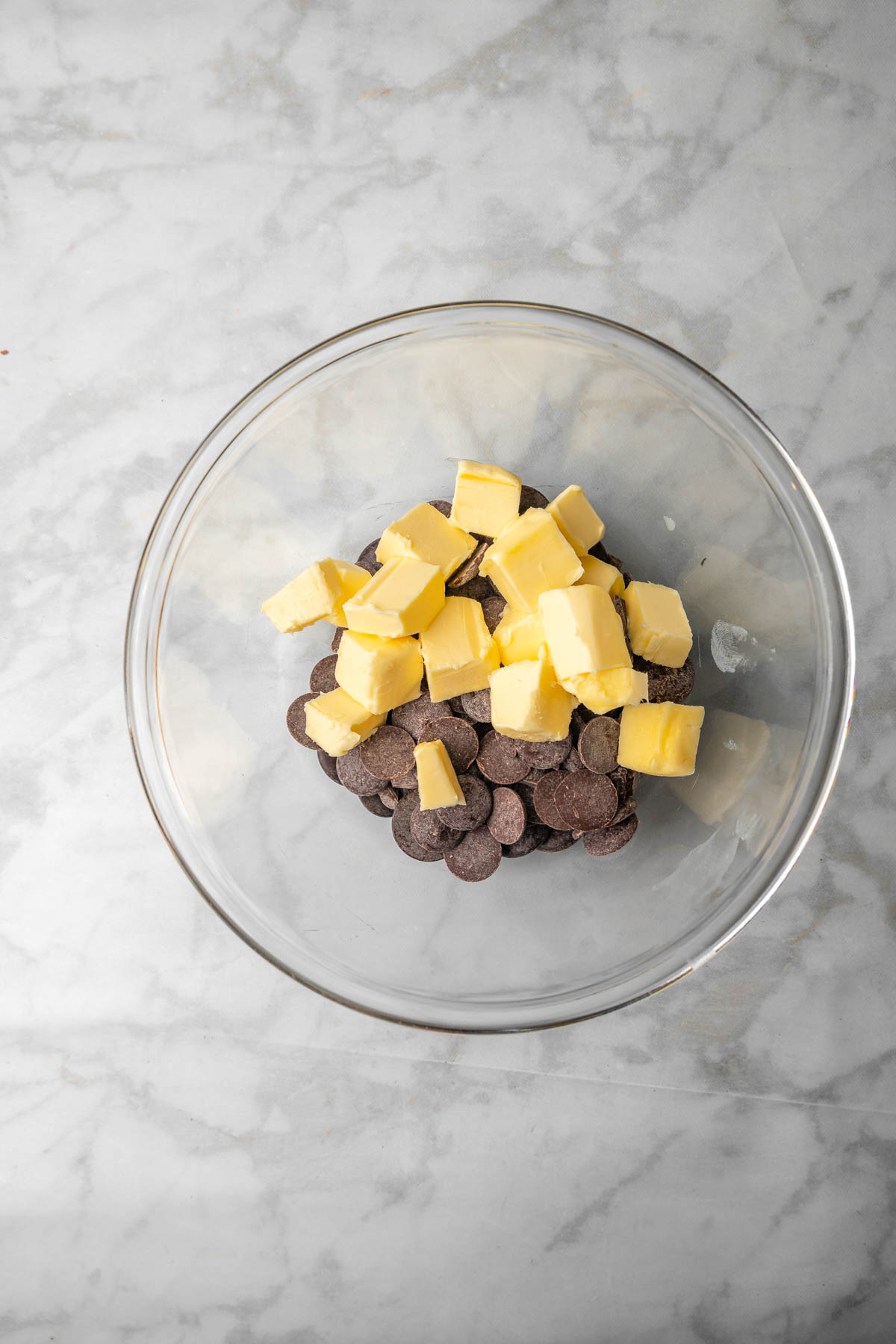 butter and chocolate in a heat safe bowl ready to be melted.