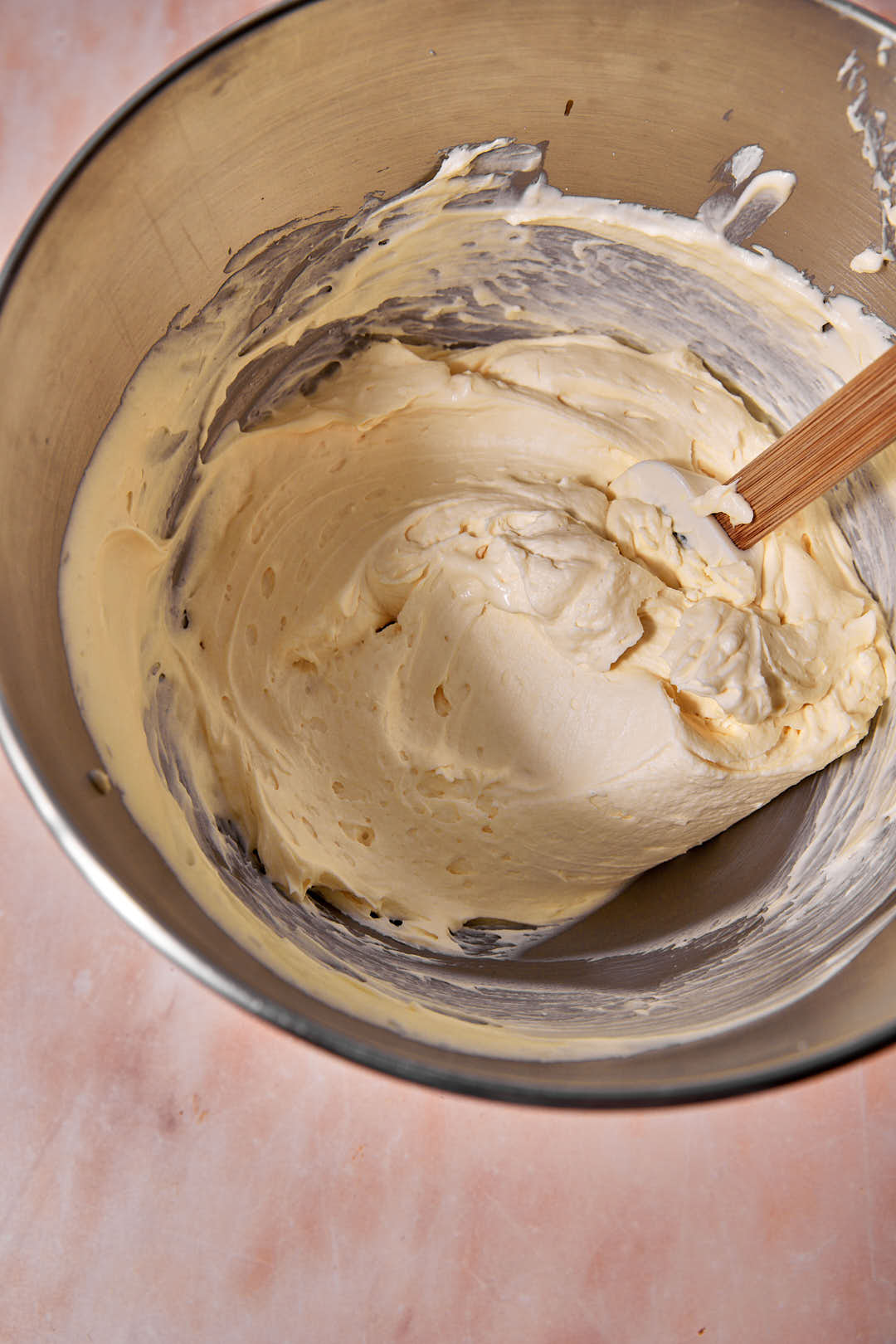 tiramisu cream in a steel mixer bowl.