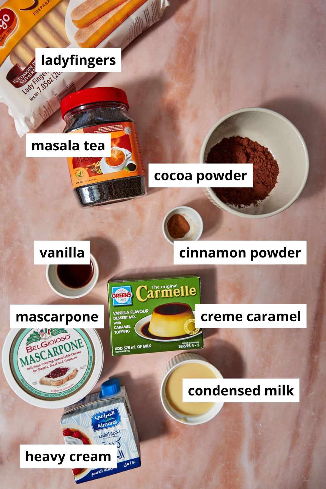 ingredients you need for chai tiramisu on a pink background