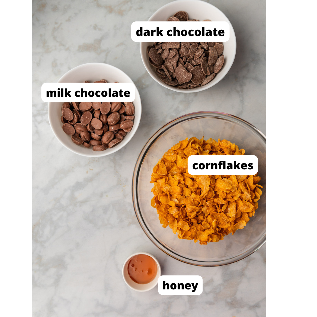 ingredients needed to make cornflake balls on white background.