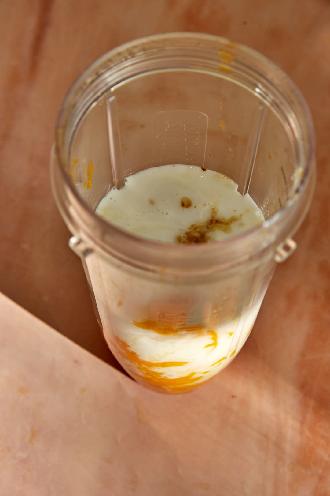 ingredients for mango sago added to a small blender.