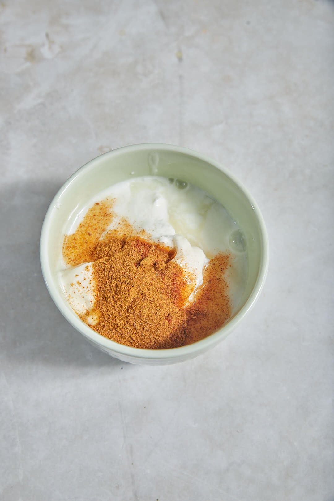 ingredients to make a creamy sauce for tacos in a bowl.
