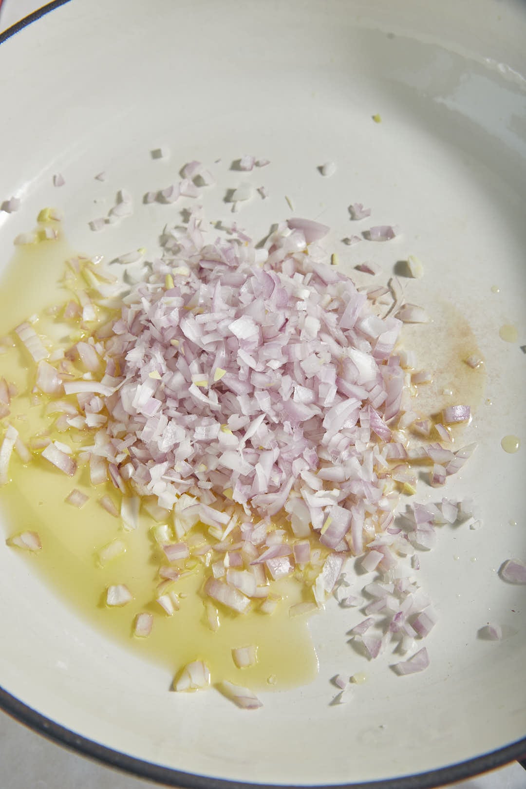 diced red onion in vegetable oil in a skillet.