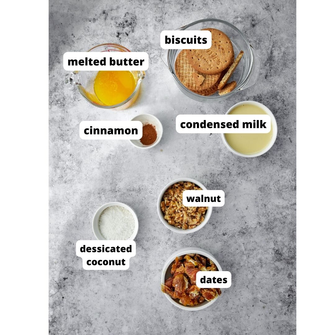 ingredients needed to make date nut bars on a grey background