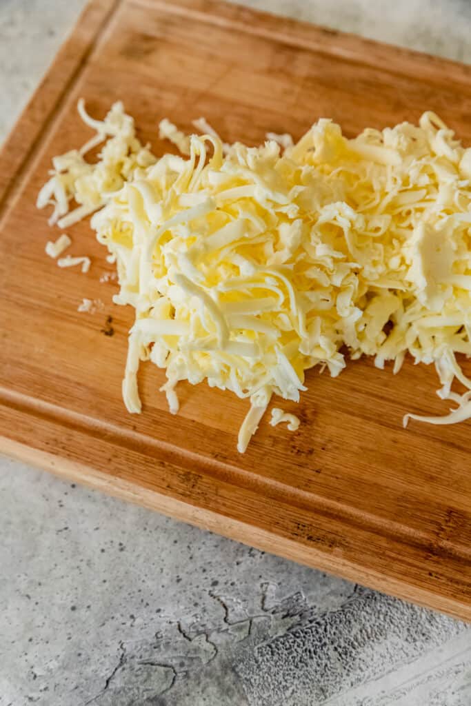 grated frozen butter on chopping board