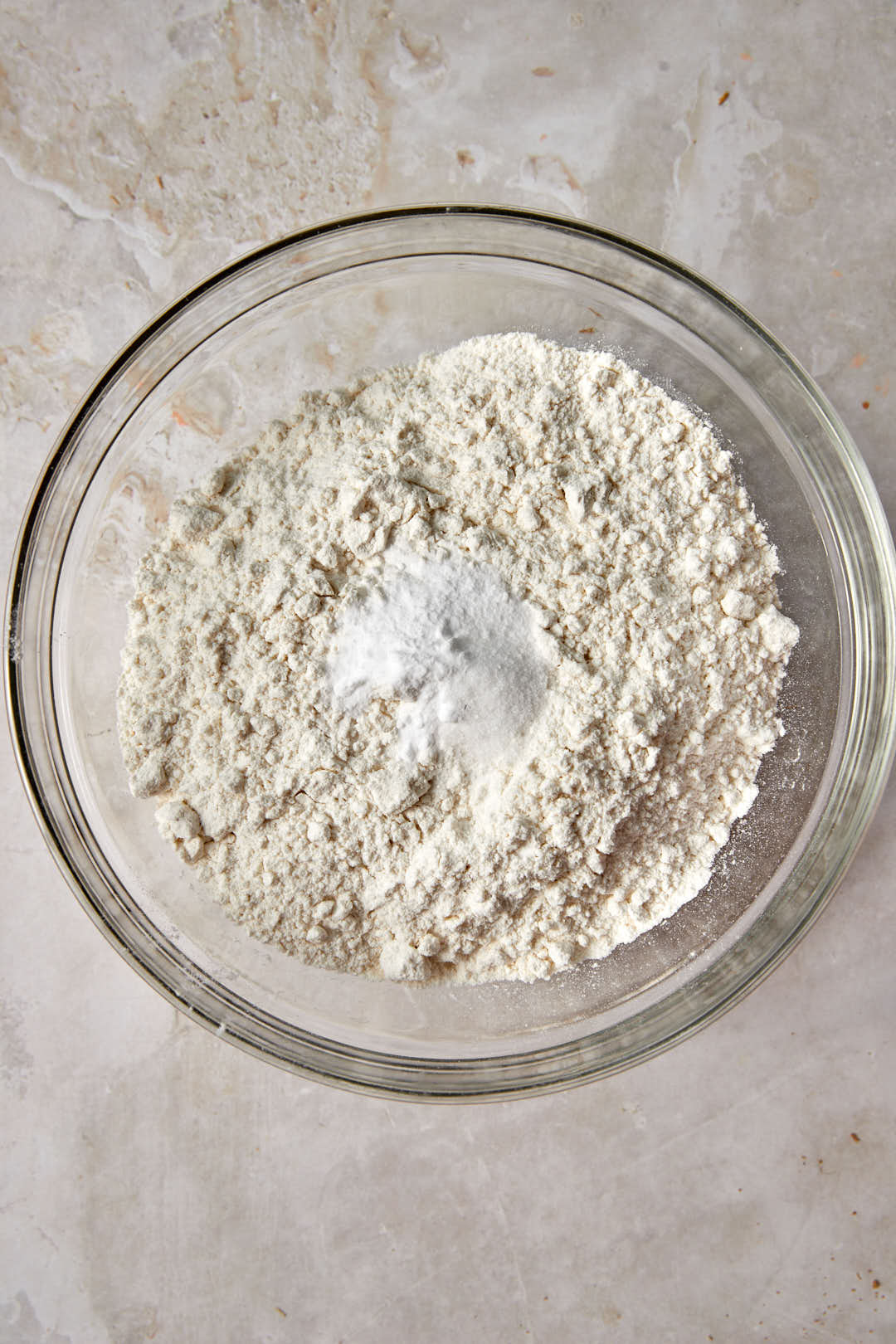 dry ingredients for cookies in a glass bowl.