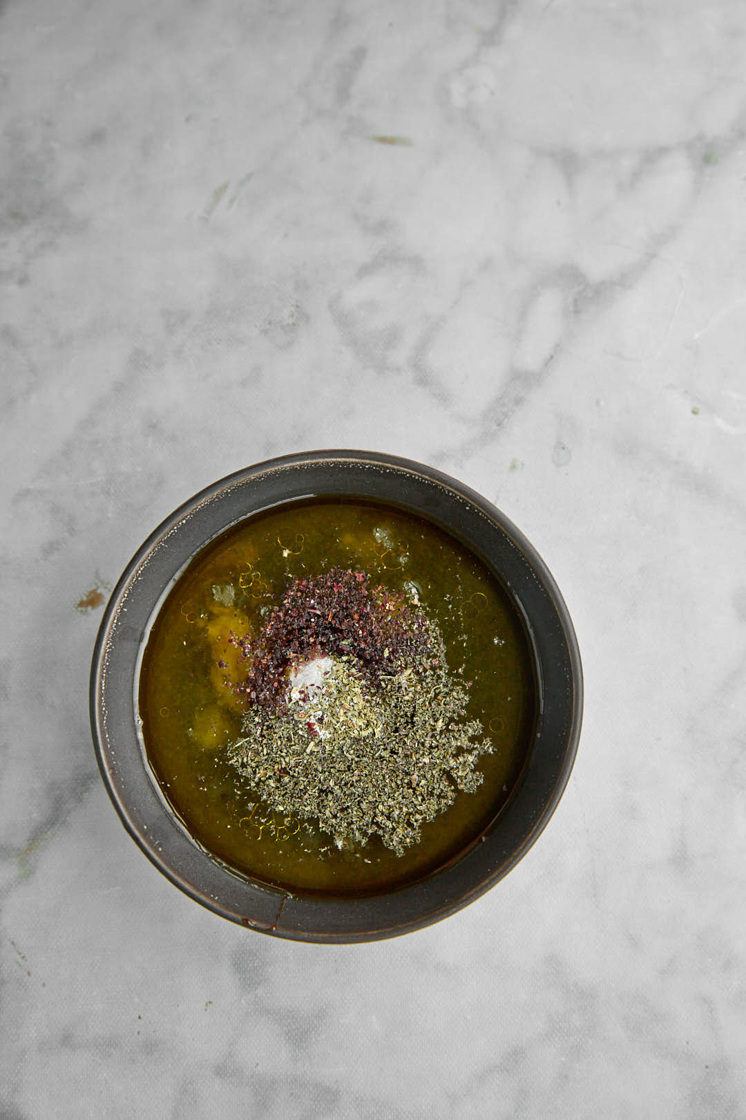 salad dressing in a small bowl.