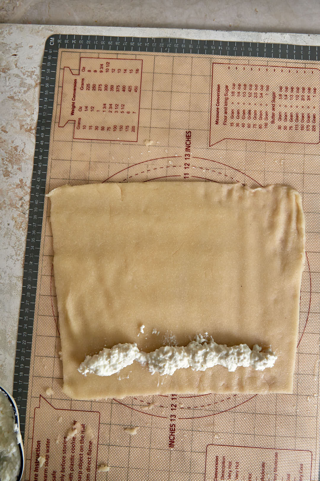 dolloped ashta on halawet el jibn dough.