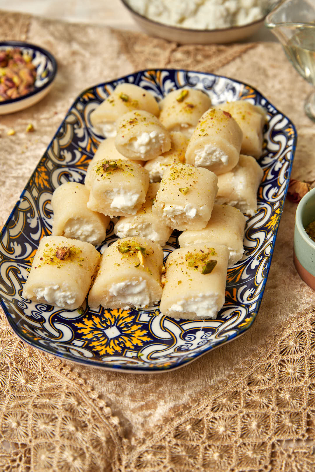 platter of halawet el jibn on a lacy tablecloth.