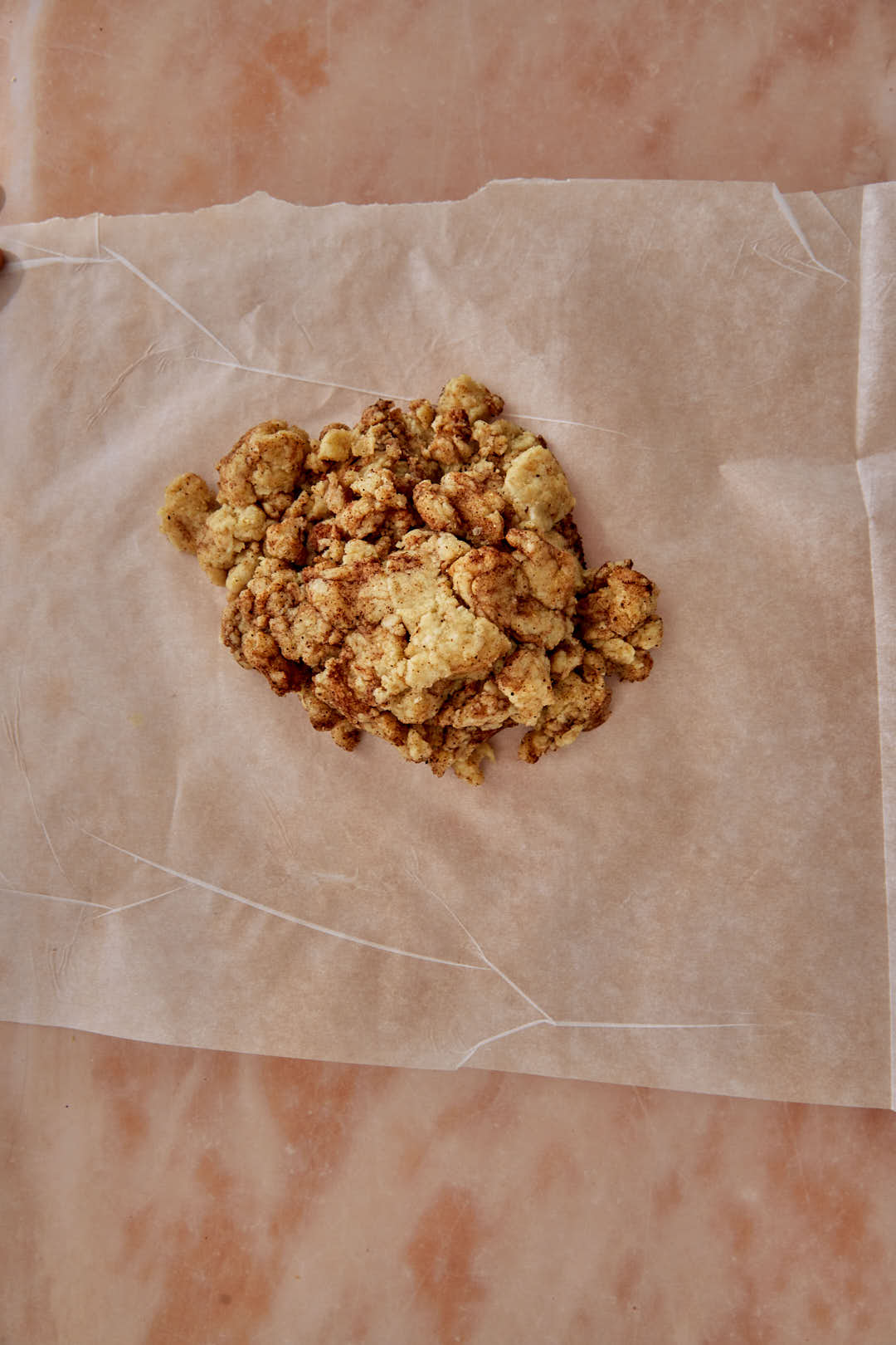 Cinnamon toast crunch dough on parchment paper.