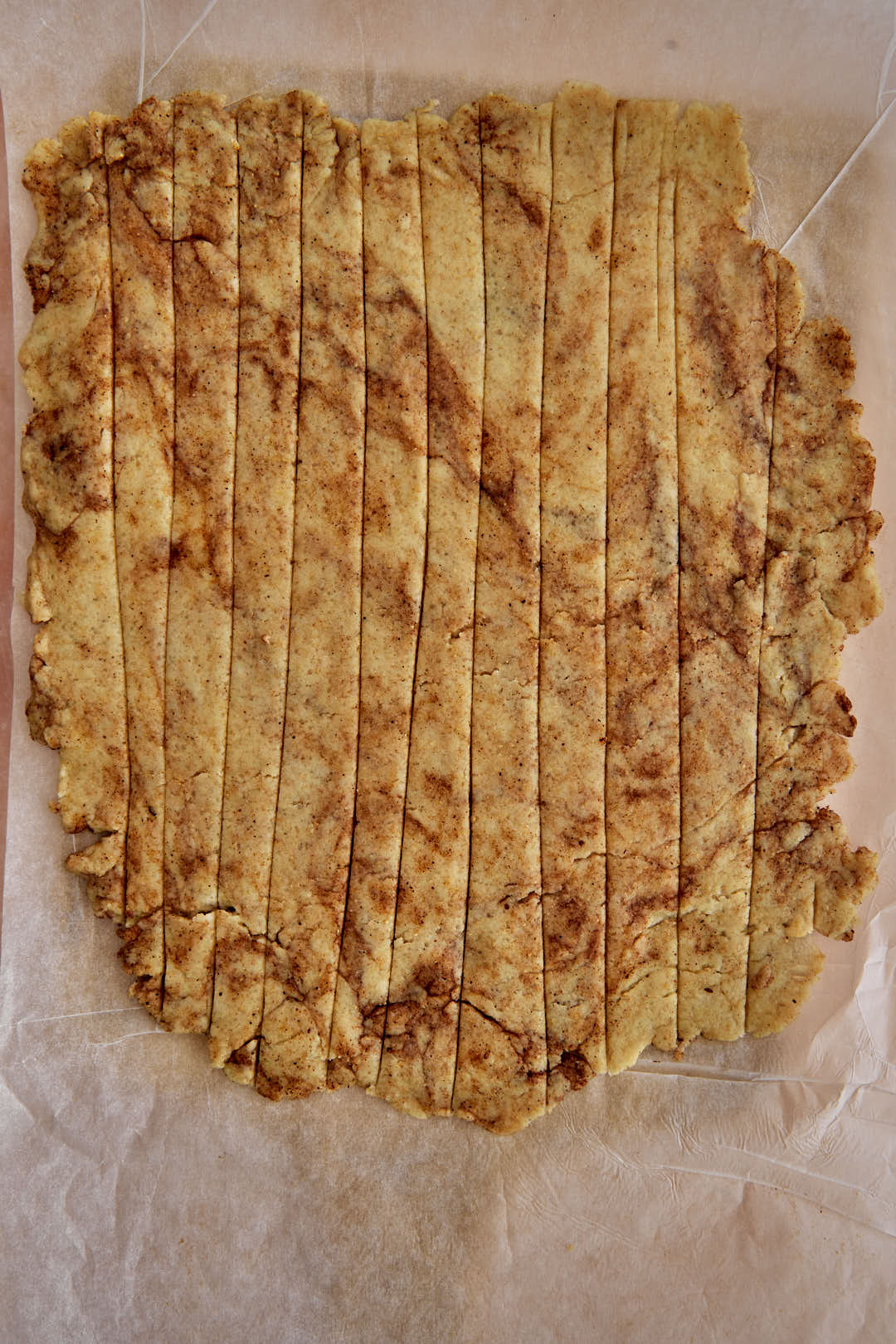 horizontal lines on cinnamon toast dough .