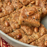 a close up photo of a hilbeh bar stacked on top of the rest of the hilba tray.