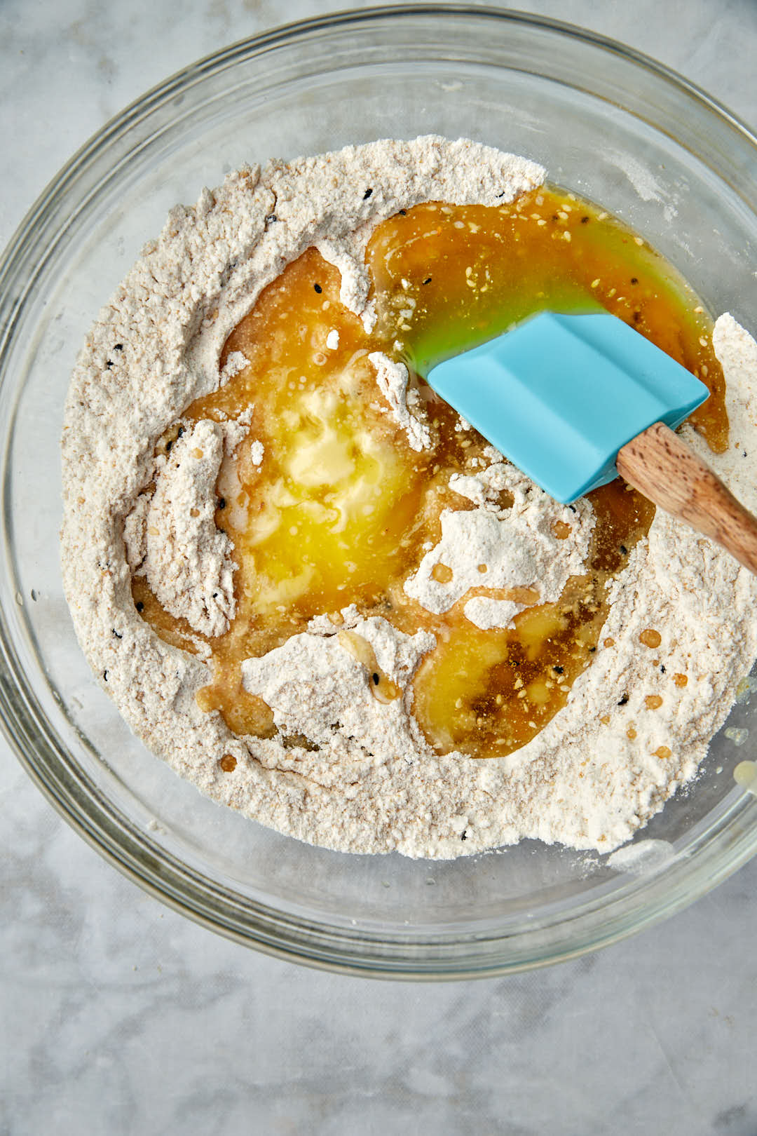 melted butter, olive oil, fenugreek water added to flour.