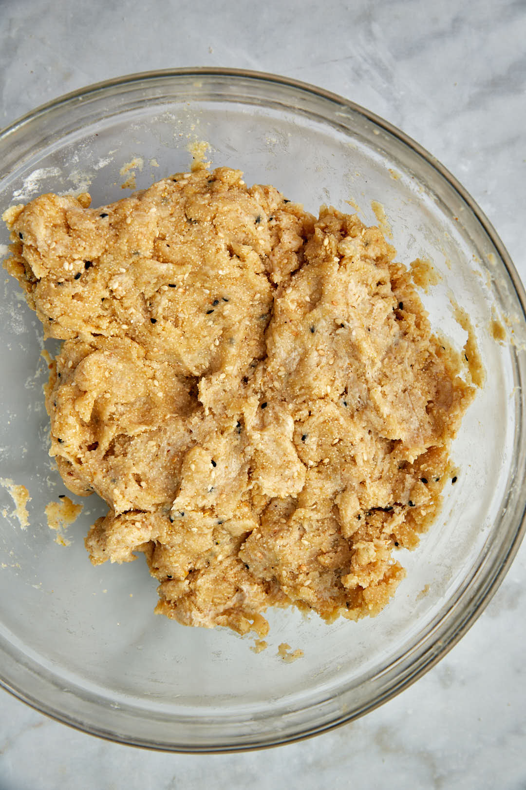 hilbeh dough in a glass bowl.