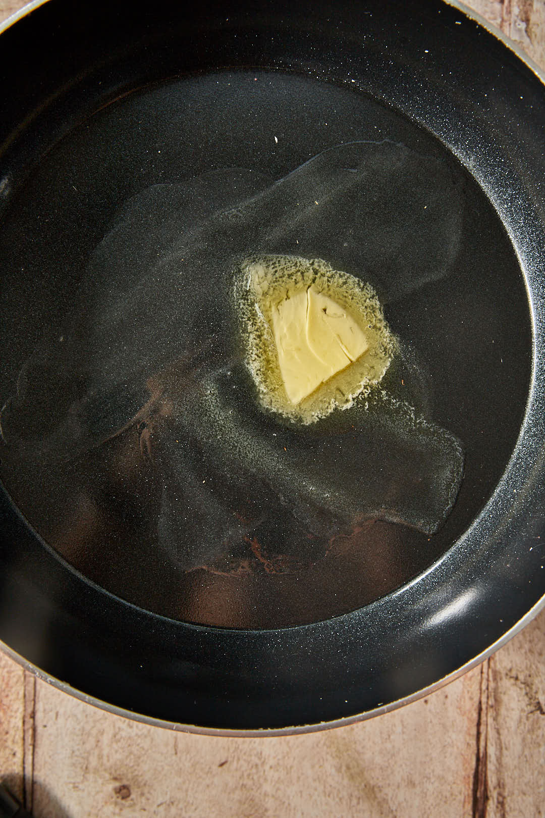 butter melting in a skillet.