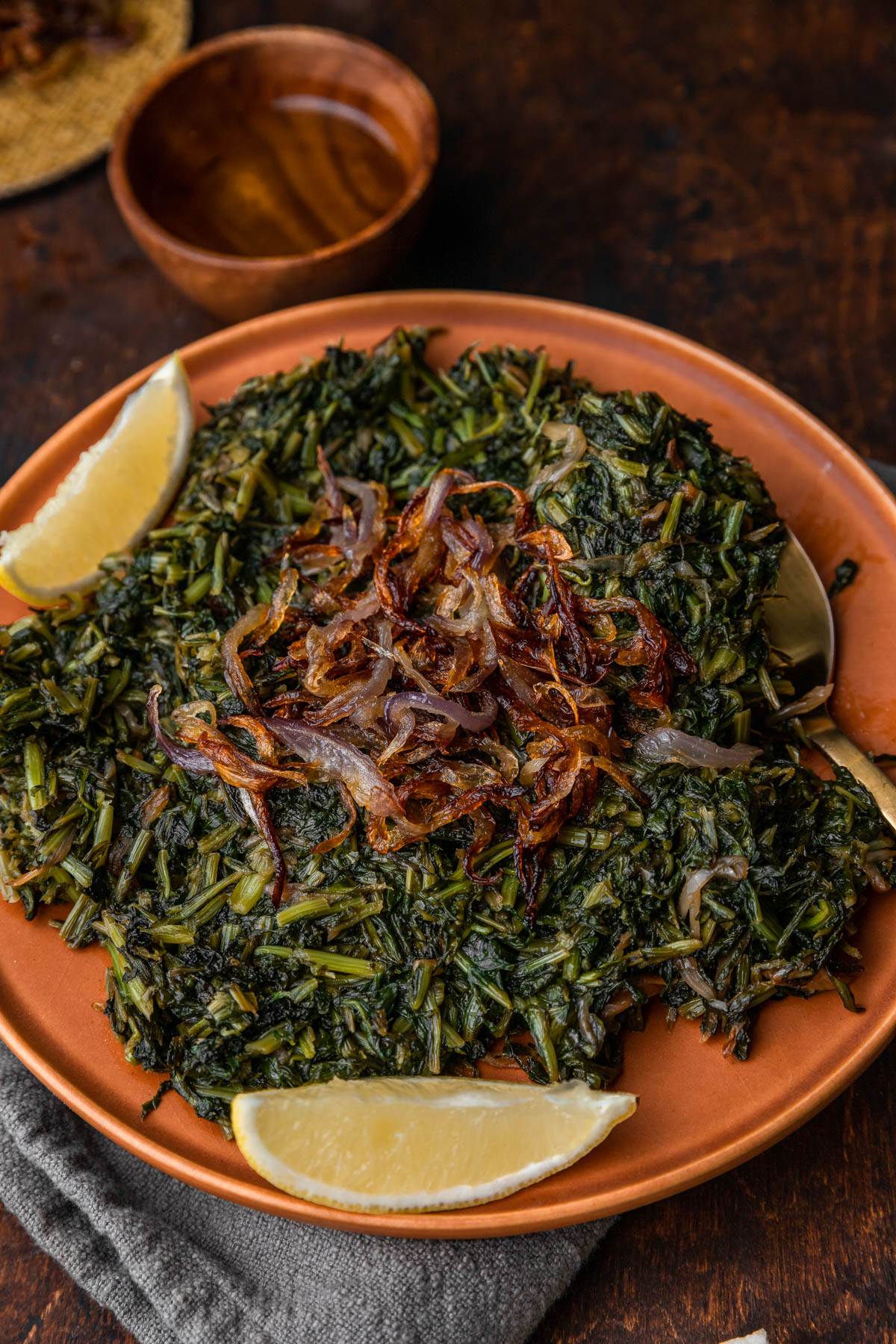 hindbeh in a plate with a small bowl of olive oil behind the plate.