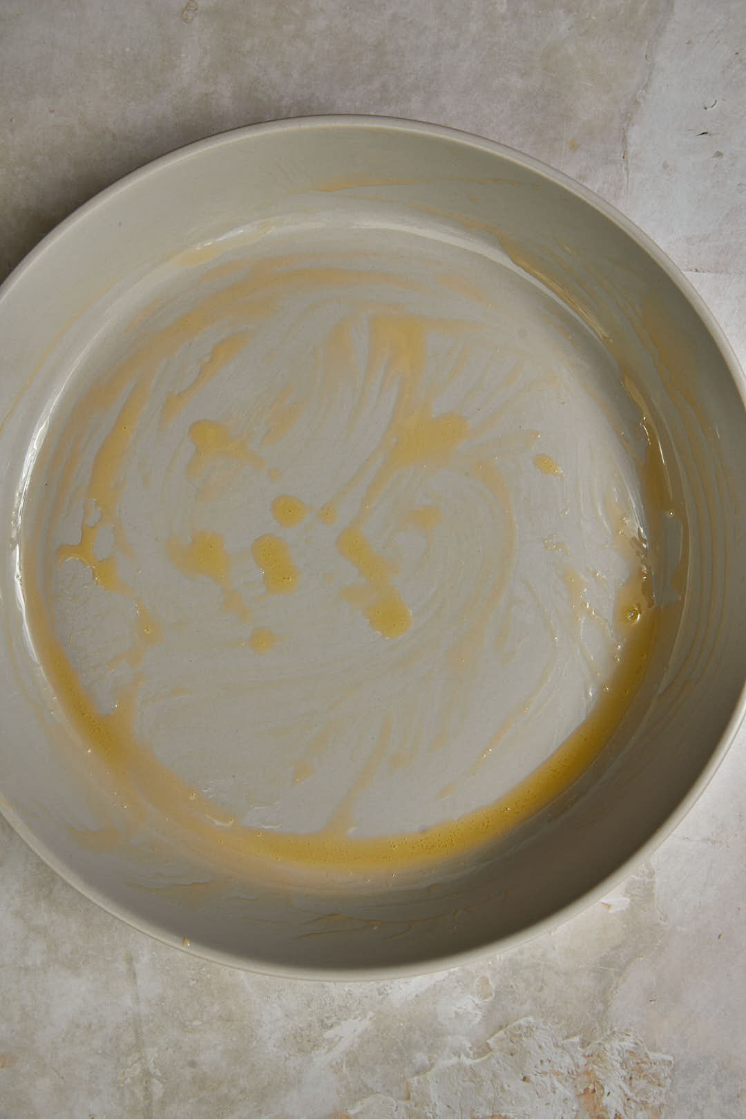lightly greased pan for assembling kunafa.