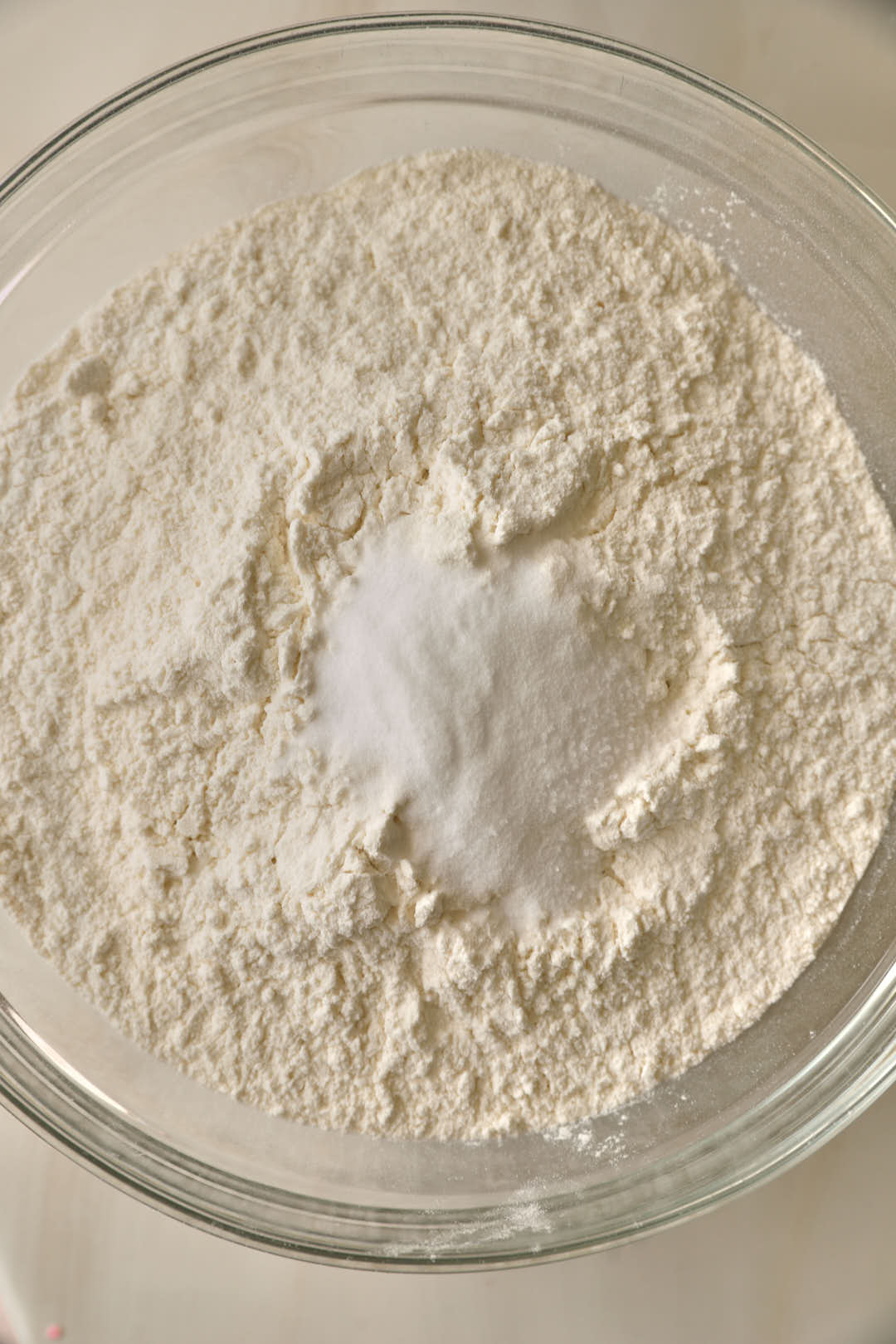 flour, baking soda and salt in a glass bowl.