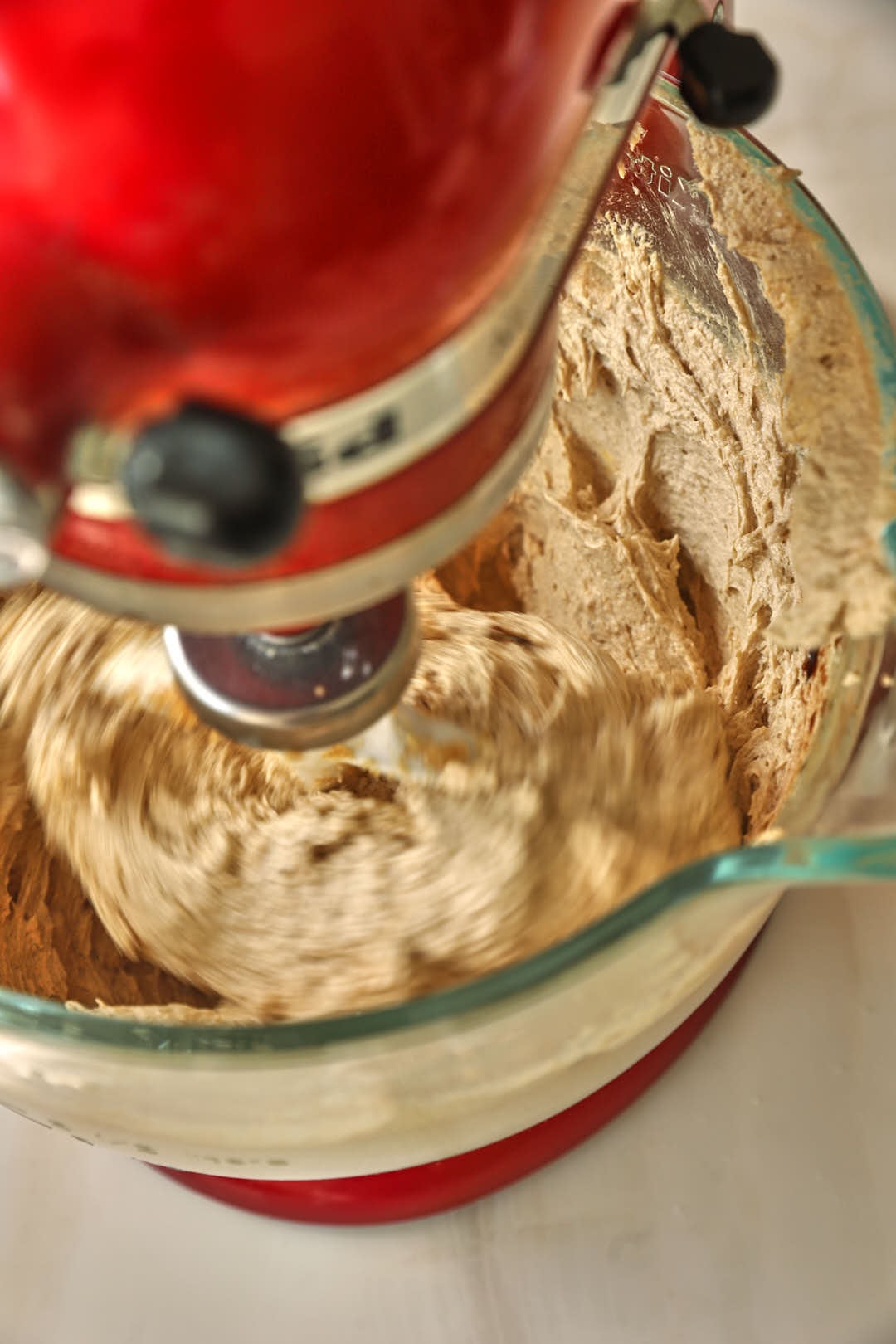 cookie dough in the bowl of a stand mixer.