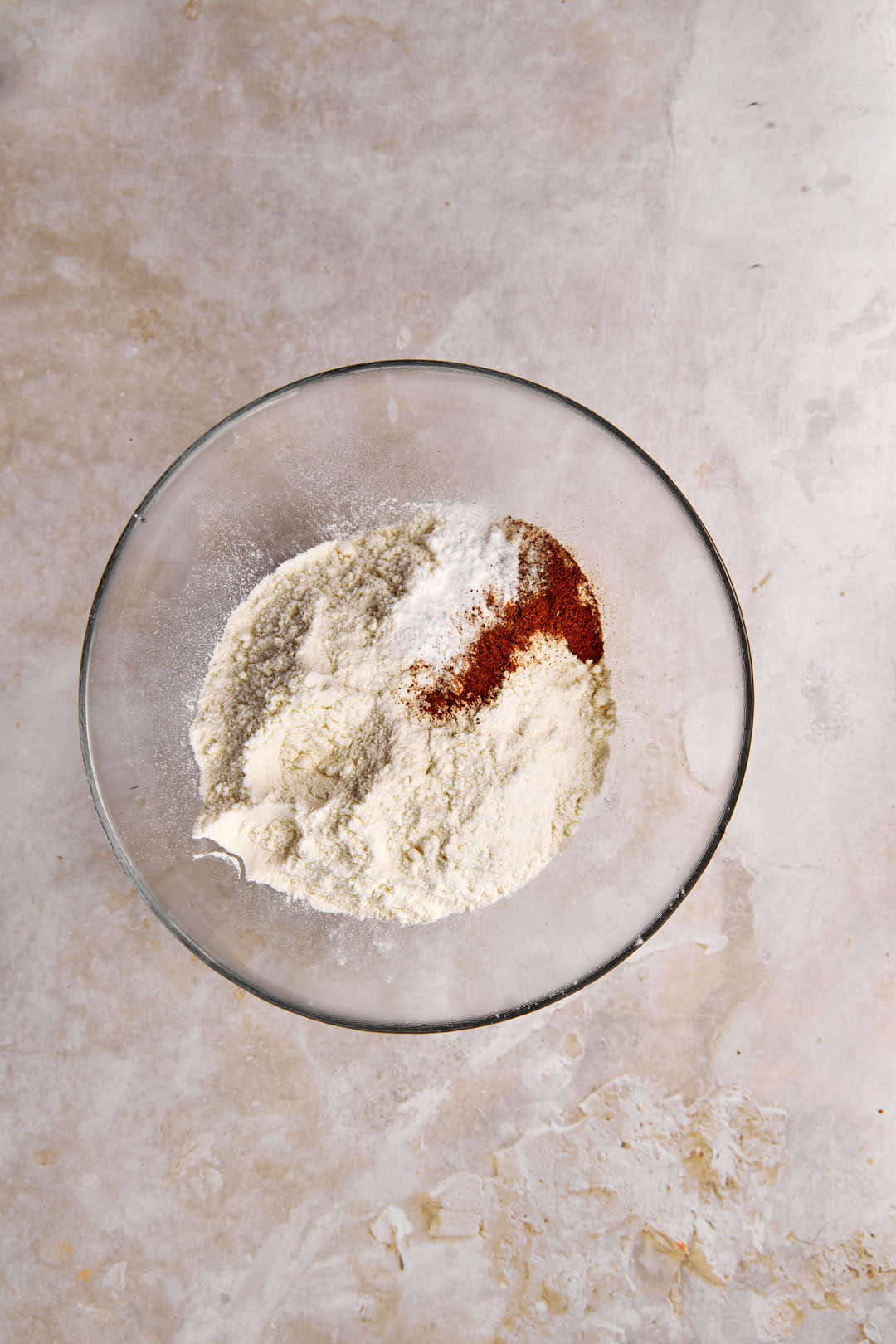 flour, cinnamon, salt and baking soda in a glass bowl.