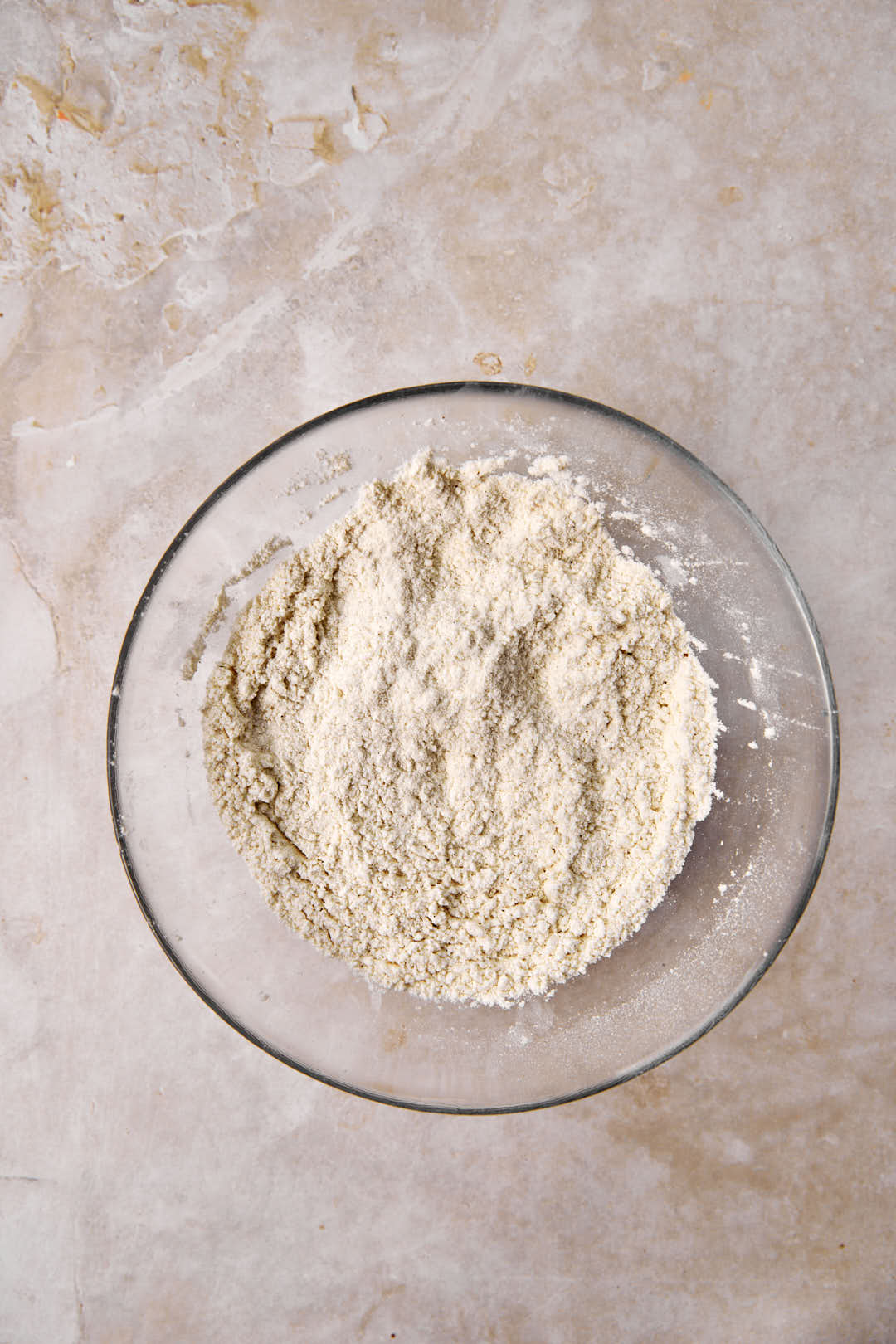 dry ingredients mixed together in a glass bowl.