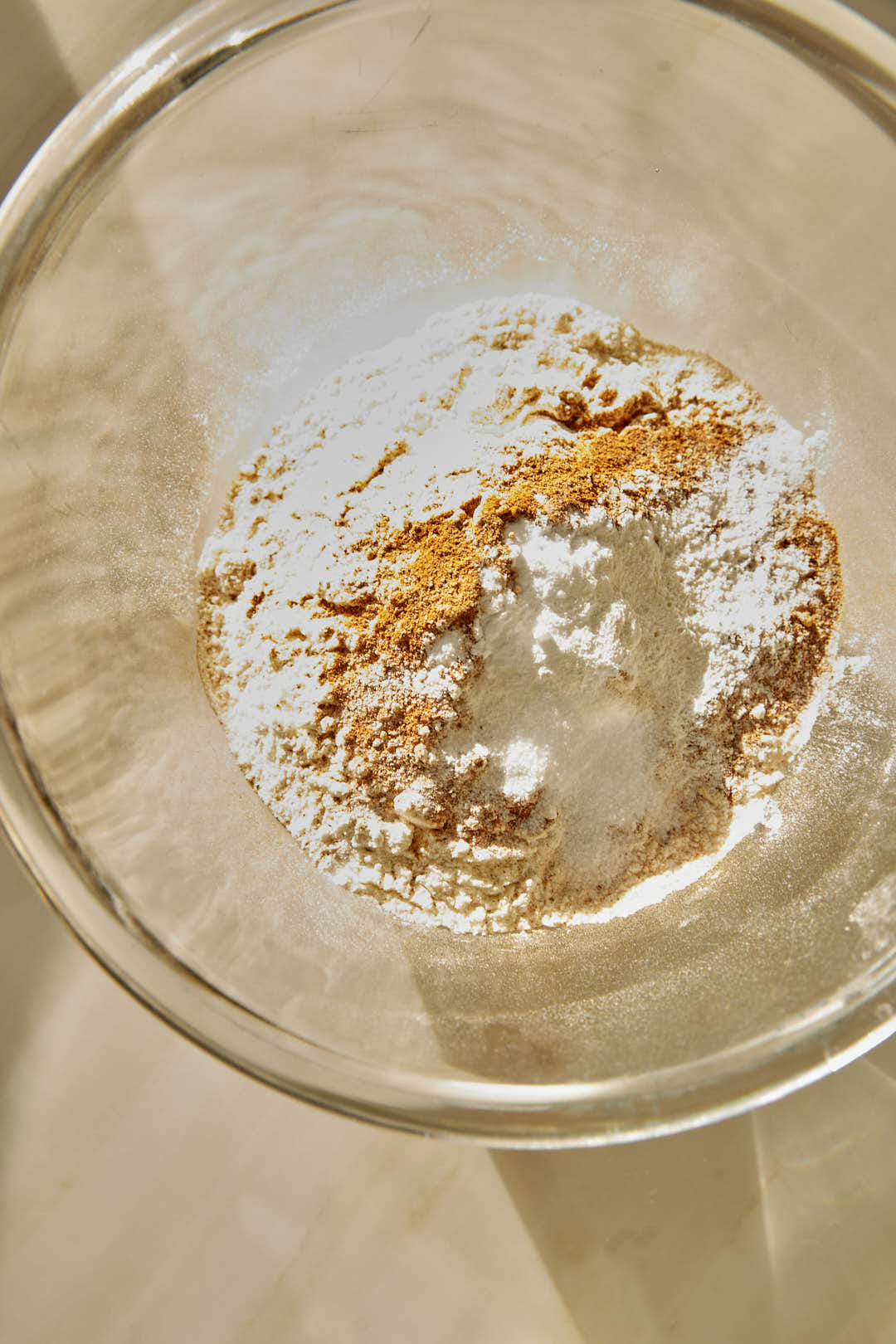 dry ingredients for cake in a glass bowl.