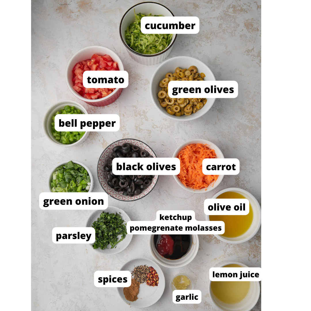 Ingredients needed to make Mediterranean olive salad in small bowls.