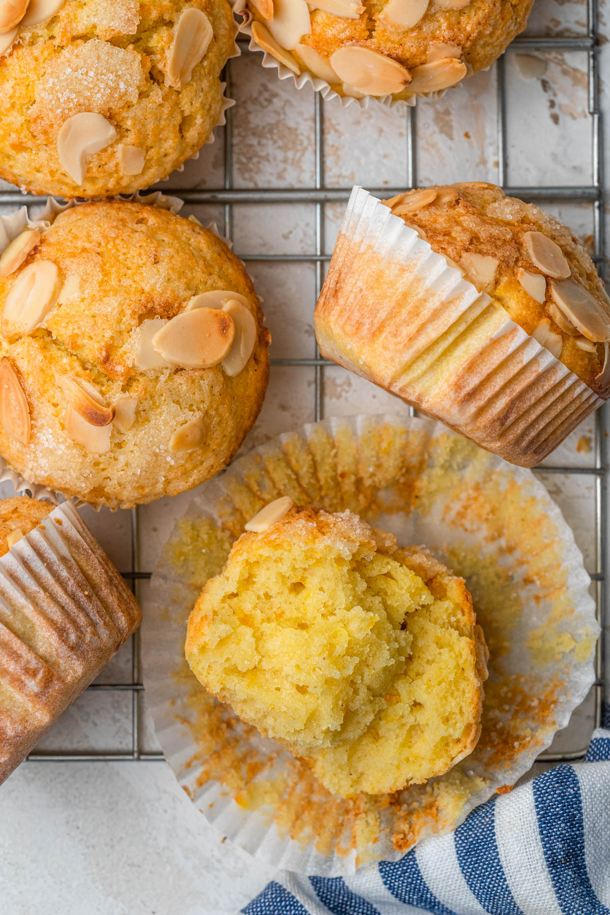 close up photo of fluffy orange and almond muffin