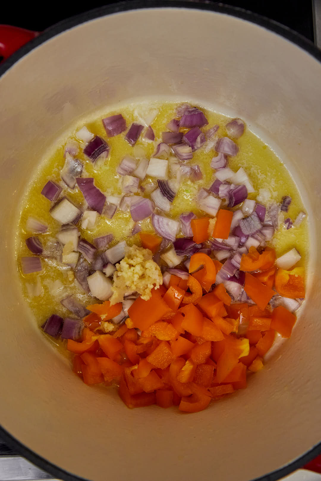 onions, bell pepper and garlic in melted butter in a large skillet.