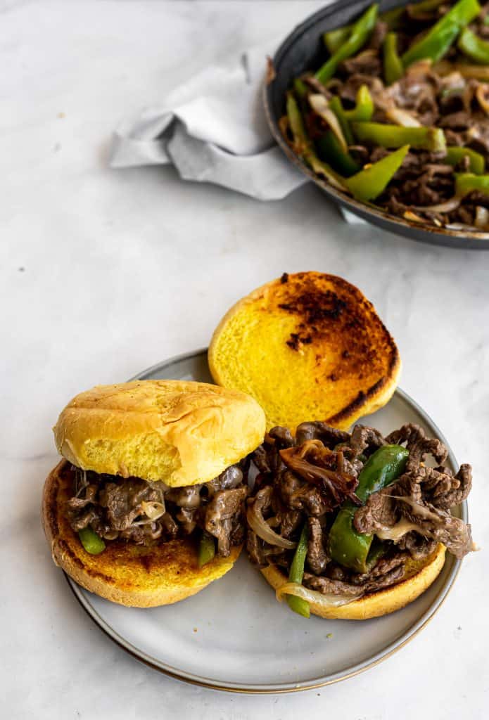 slider buns stuffed with philly cheesesteak filling