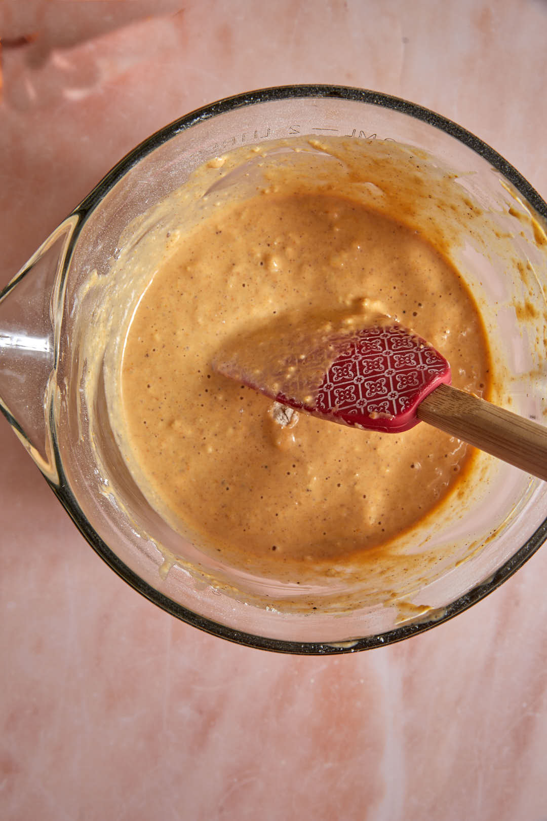 Pumpkin pancakes from pancake mix batter in a glass bowl.