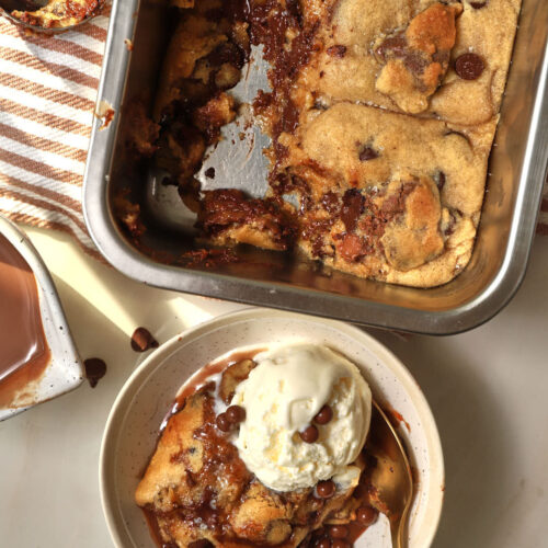 scoopable cookies in a small bowl with a scoop of icec ream.