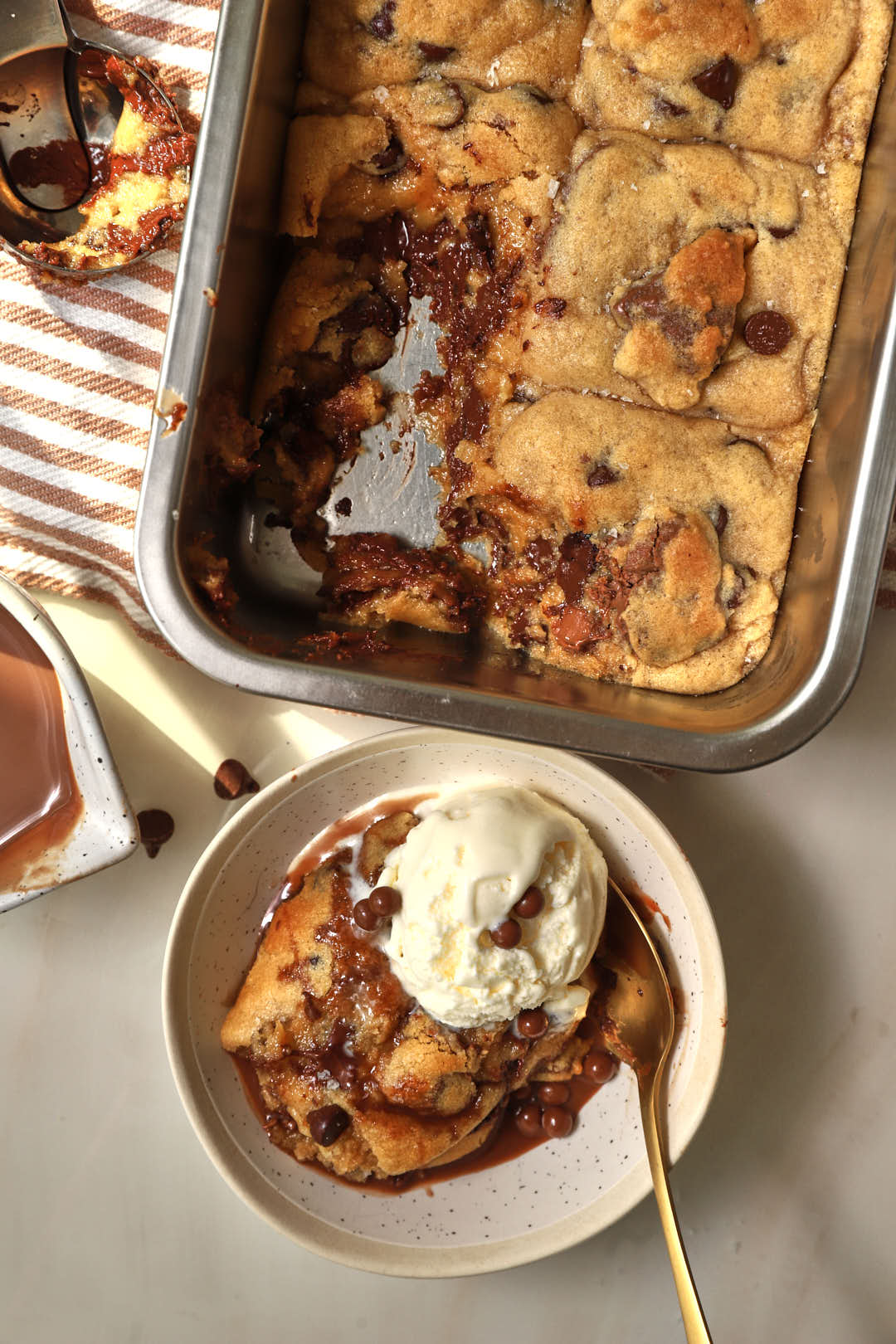 scoopable cookies in a small bowl with a scoop of ice cream.