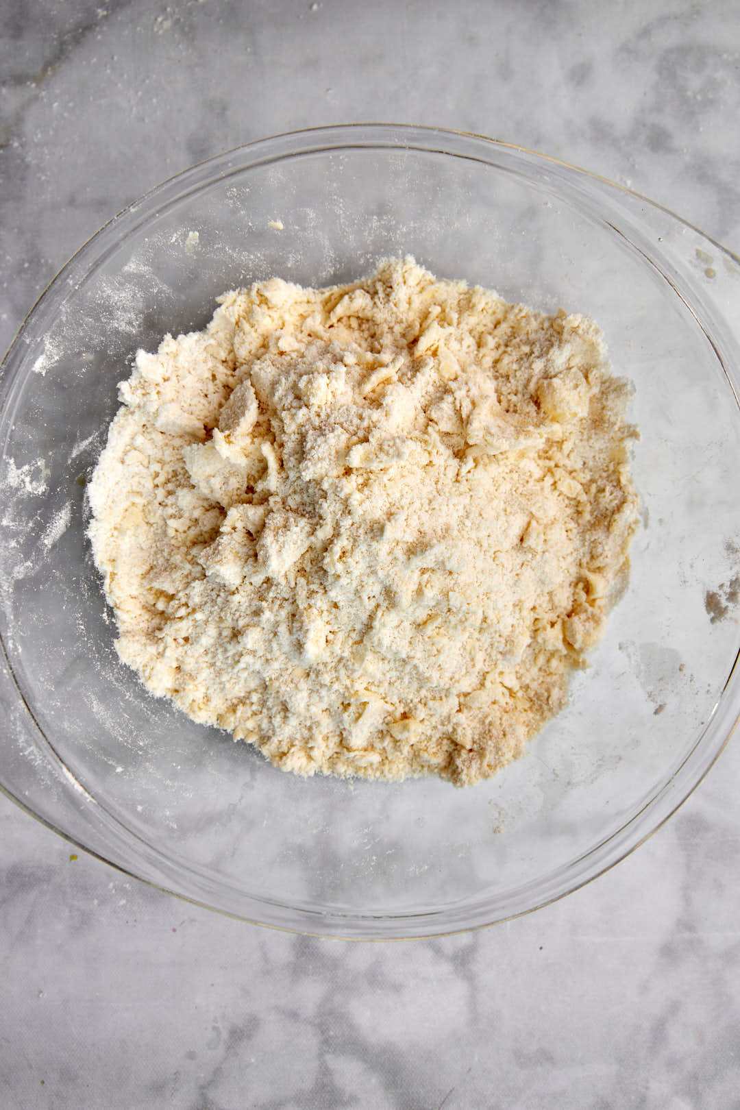 Pea sized butter pieces worked into a flour mixture.