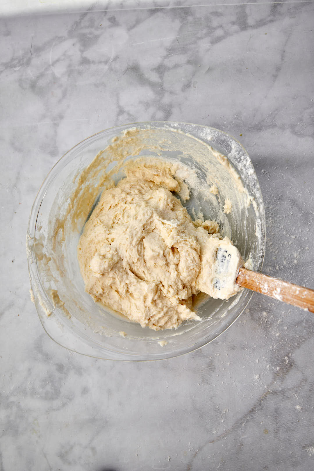 buttermilk biscuit dough in glass bowl.