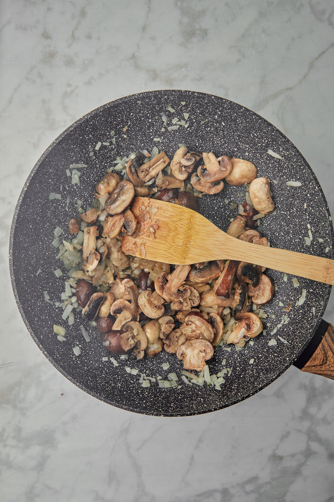 sauteed mushrooms, onoins and garlic in a skillet.