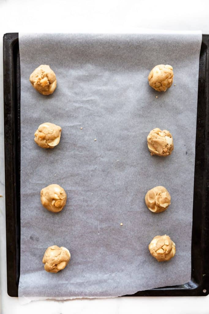 subway white chocolate macadamia cookie dough on parchment paper